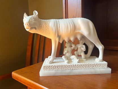 Roman she-wolf nursing the infant twins Romulus and Remus nursing 