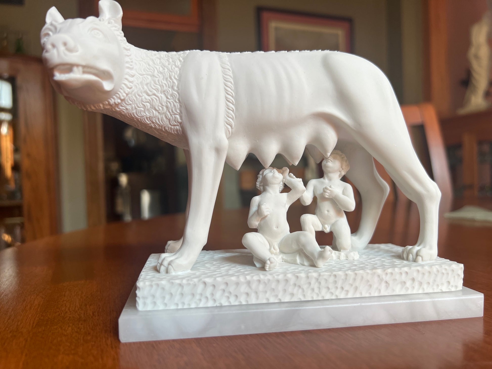 Replica Romulus and Remus sculpture on a genuine alabaster pedestal