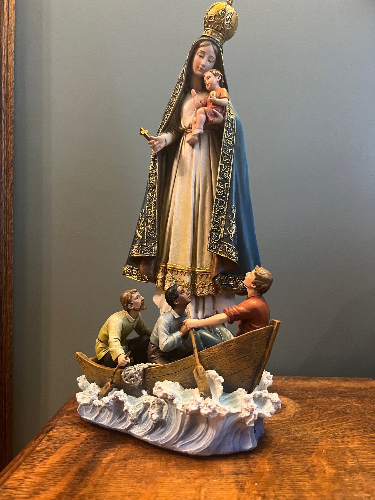Our Lady of Charity of the Sea Statue the people in boat sculpture