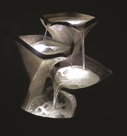 Cascading Pools Fountain is a stunner at night time view of modern sculpture