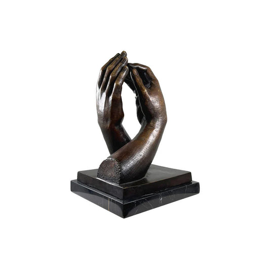 Symbolic bronze hands sculpture by Auguste Rodin mounted on black marble base