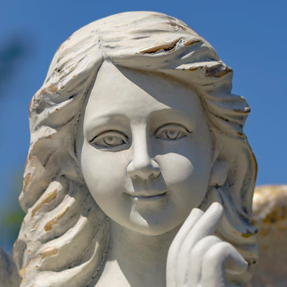 Close up of face Large scale memorial angel garden statue antique white