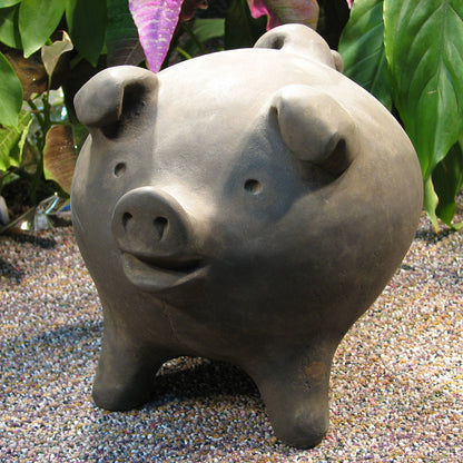 Cement Chanchito Pig Garden Statue with smiling face rooted in Chilean tradition