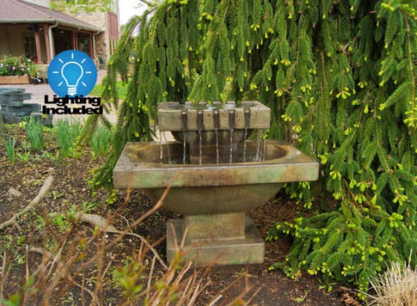 Reminiscent of an French fountain found in a village square cast stone