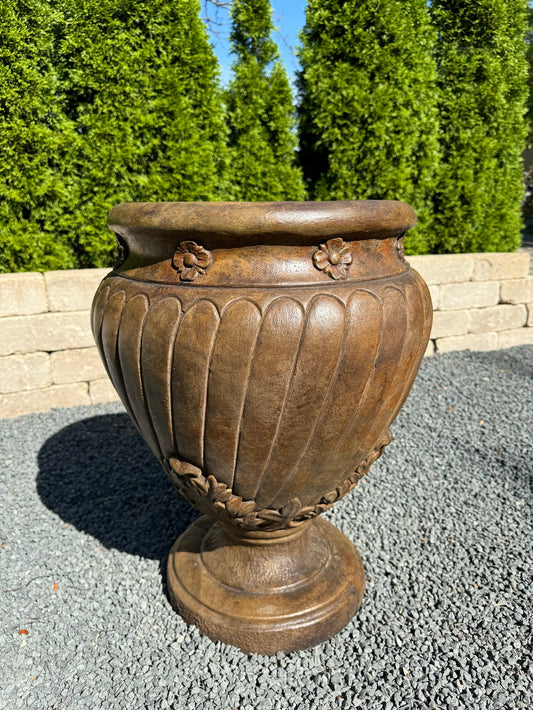 Italian-inspired garden urn 23 inch with sculpted detailing and pedestal base.
