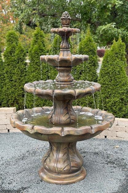 four tier Italian spillover fountain cast stone large estate spill water in garden setting