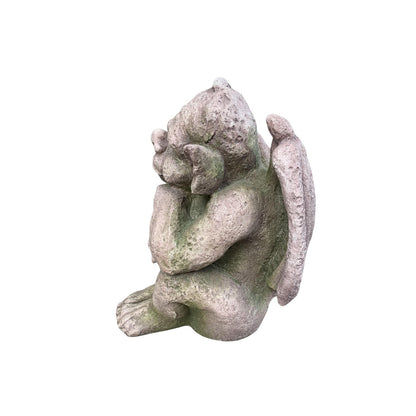 Curious Castle Gargoyle Figure side view of statue