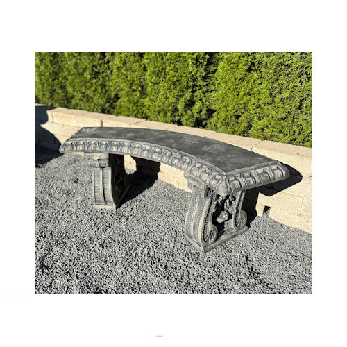 Grape leaf curved garden bench with vines and clusters on the leg of the seating
