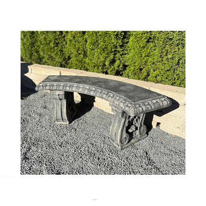 Grape leaf curved garden bench with vines and clusters on the leg of the seating