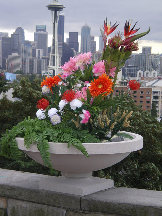 Susan Lawrence Dana House Garden Planter shown with flowers in the urn