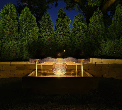 Dancing Spheres Modern Fountain Estate Size 3 balls lighted shown at night with light on