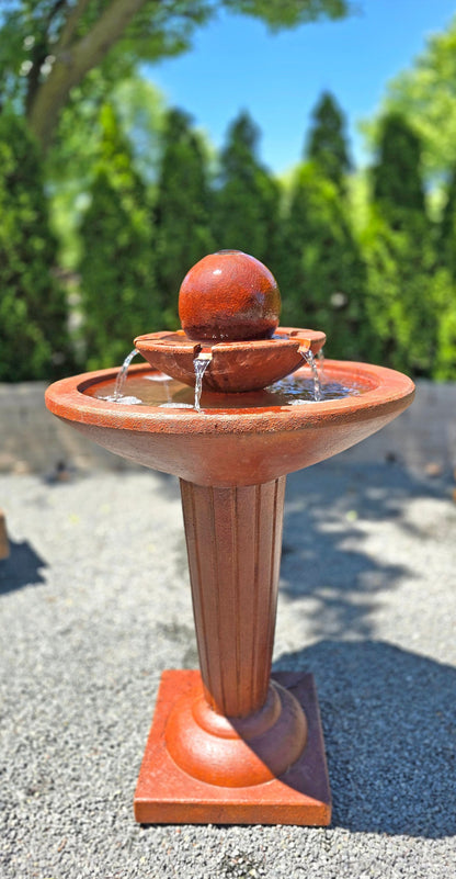 Henri Studio cast stone sphere fountain with flowing water