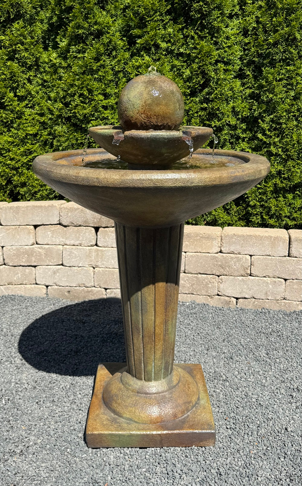Delphi sphere patio fountain with copper spill water action