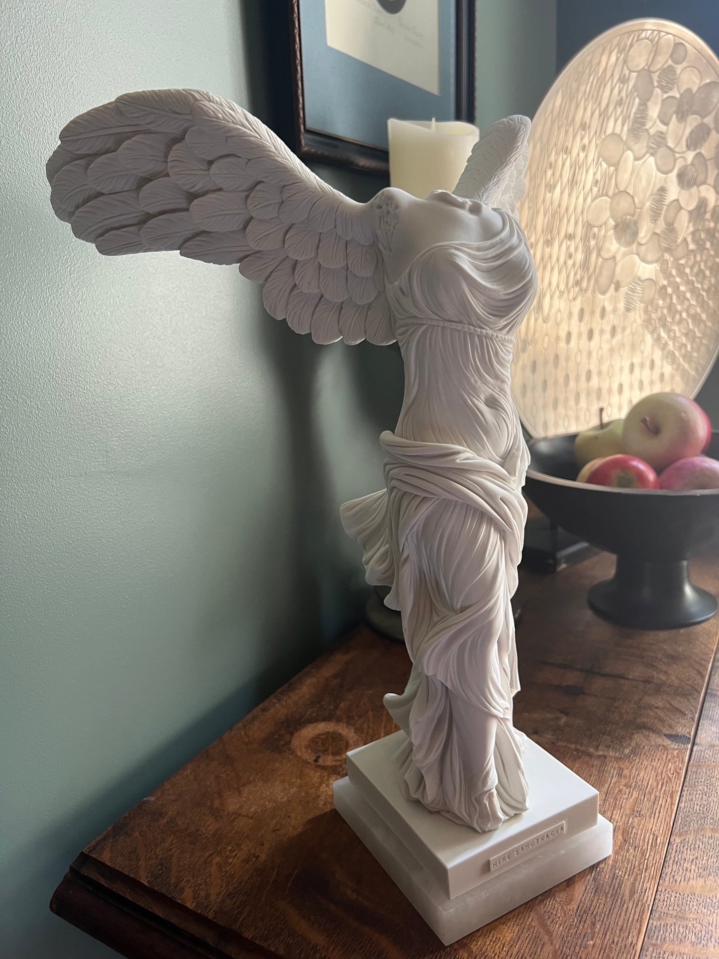 Detailed feathered wings on Victory of Samothrace reproduction