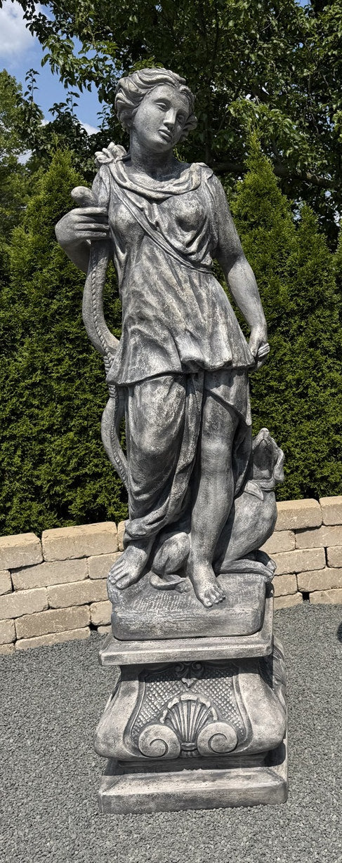 Diana statue life size Artemis cement garden sculpture on a pedestal outdoor estate  