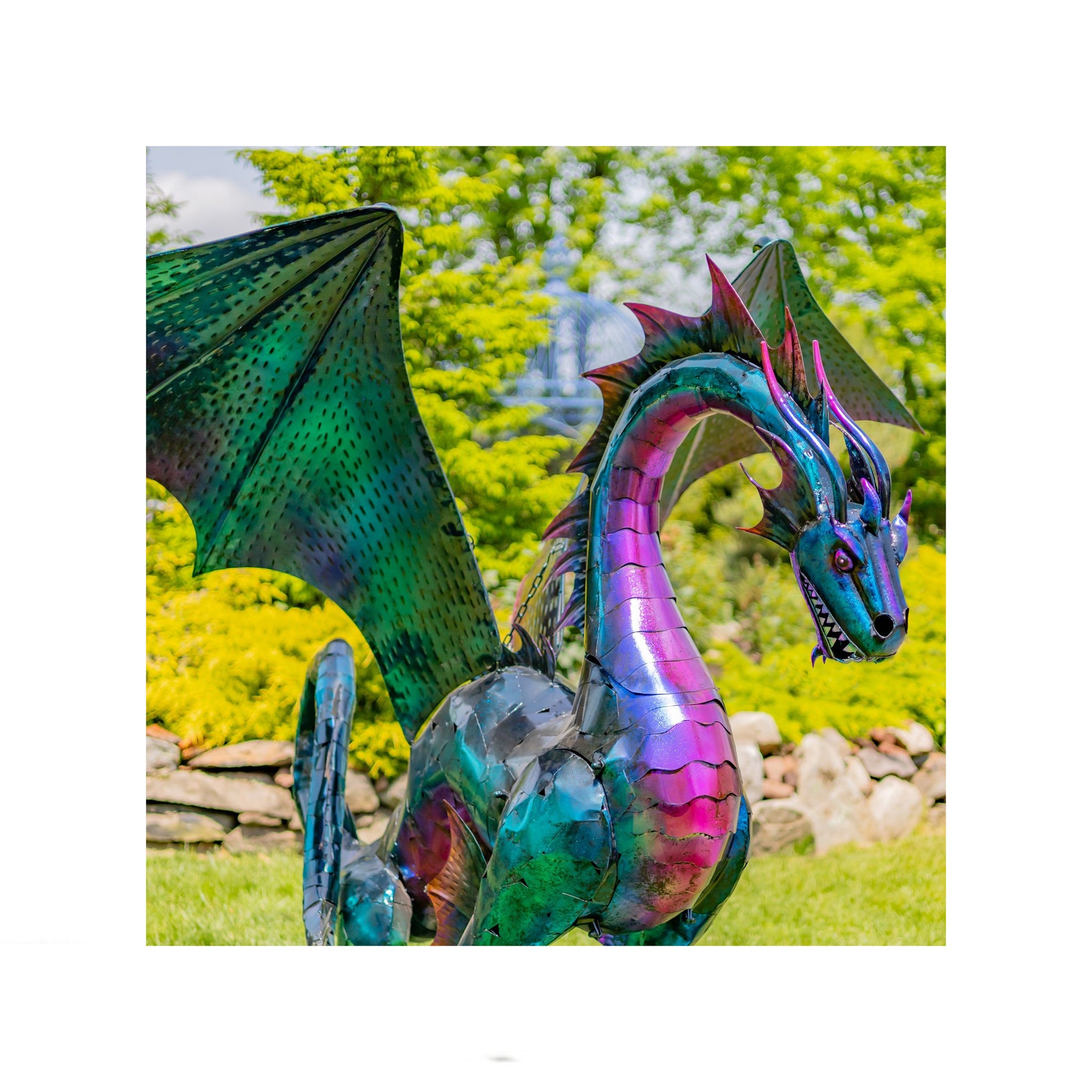 Colorful dragon sculpture in a garden setting Colorful statue life sized