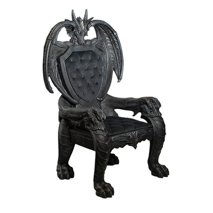 Decorative black dragon chair with a shield backrest on a white background