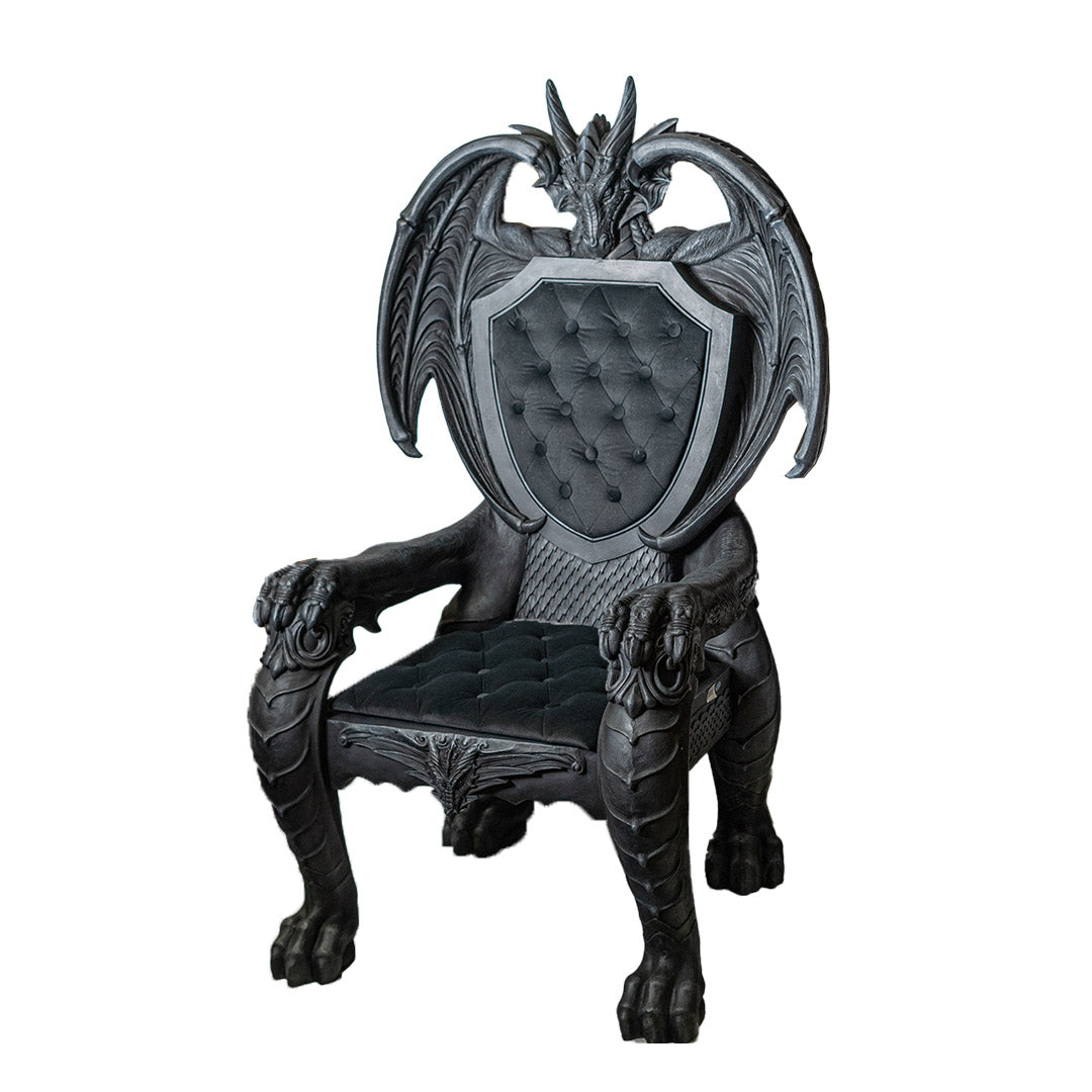 Decorative chair with dragon design on a white background