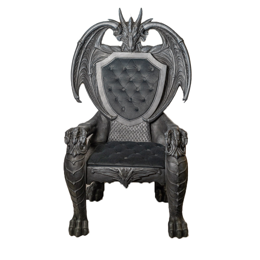 Dragon throne chair with winged back and shield detail sculptural seating