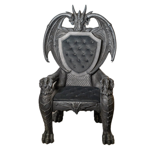 Dragon throne chair with winged back and shield detail sculptural seating
