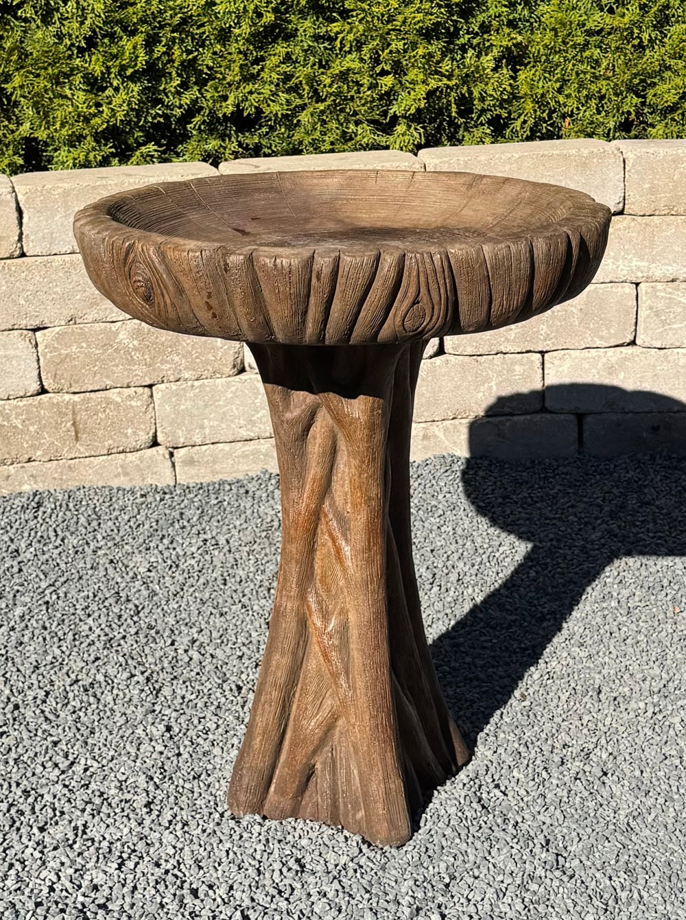 Cast stone driftwood birdbath with tree trunk base