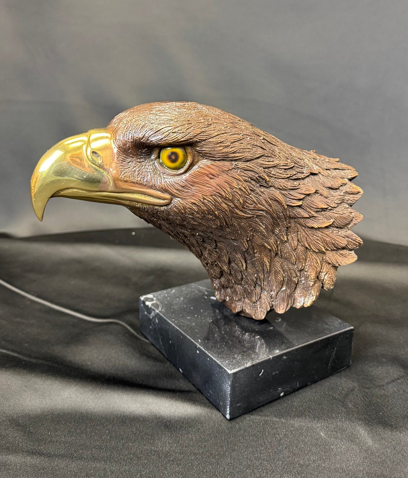 Executive eagle head sculpture for office or award display made of bronze mounted a black marble base