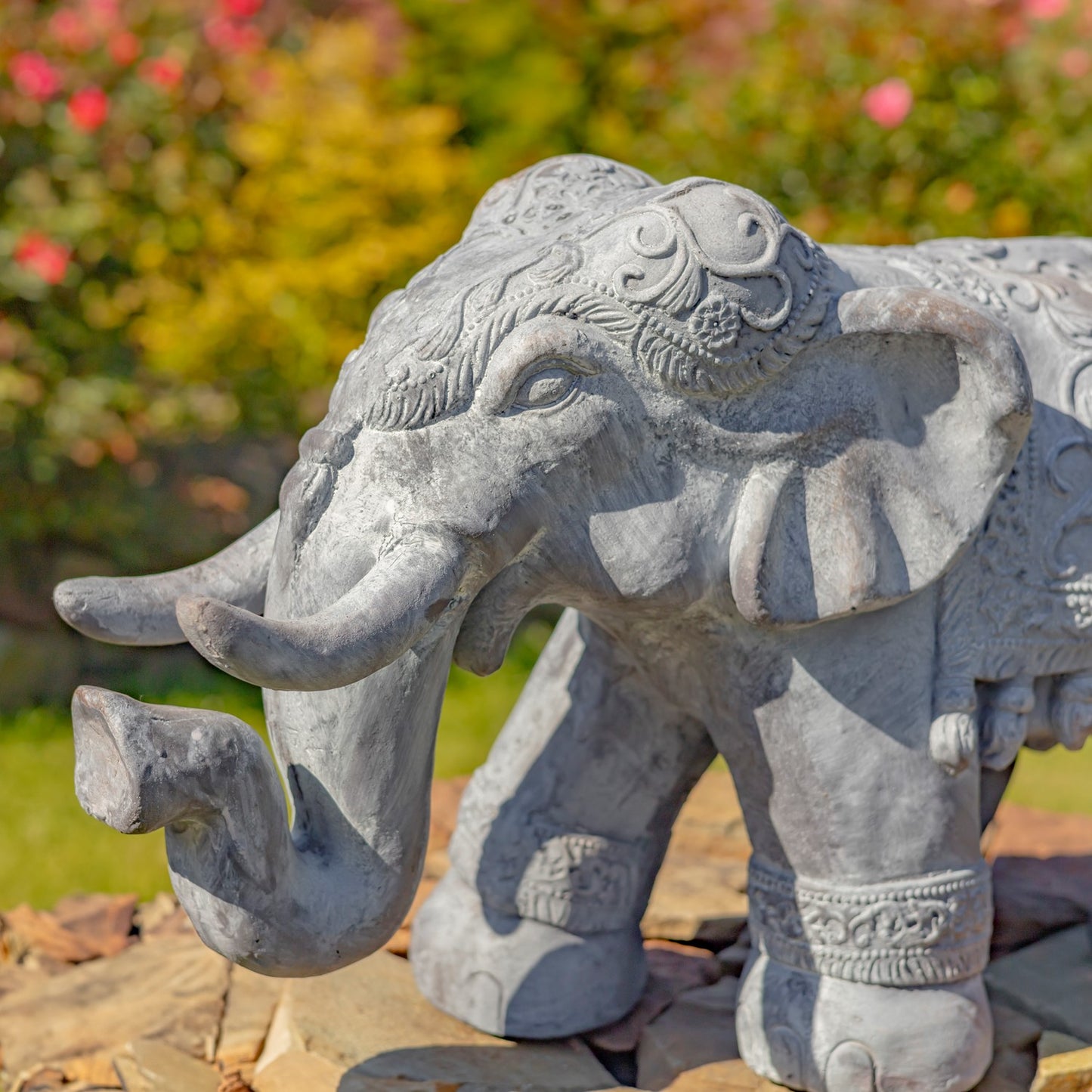 Close Up of Head Heavyweight Elephant Outdoor Sculpture with Raised Trunk