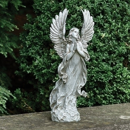 Eternal Angel Memorial Sculpture appearing to emerge gracefully from chiseled stone