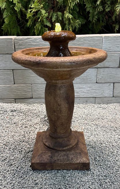 Europa cast stone fountain with bubbling water feature lighted