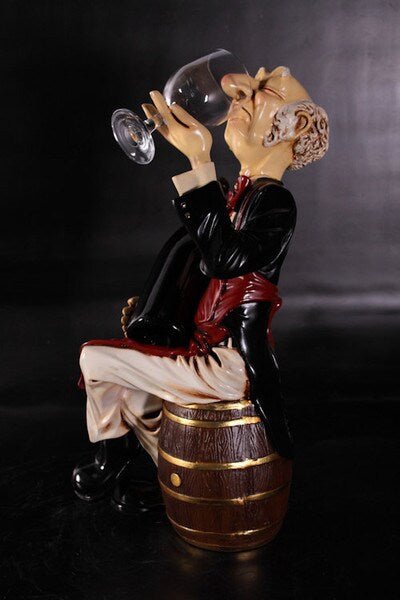 Wine Connoisseur Sitting On Barrel Sculpture Sniffing Glass aficionado