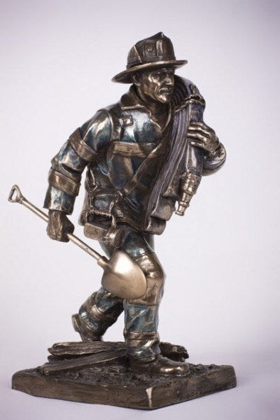 Fireman Responding to Call Statue