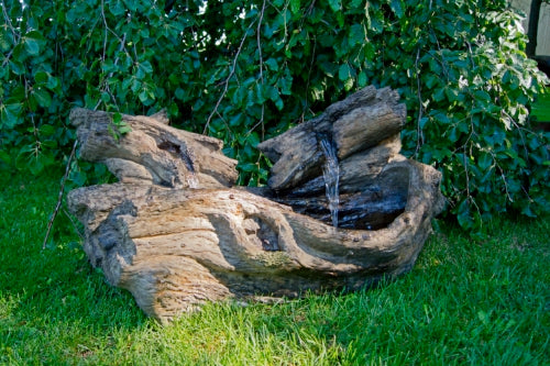 naturalistic cascading fallen logs garden fountain is sure to be the crowning statement