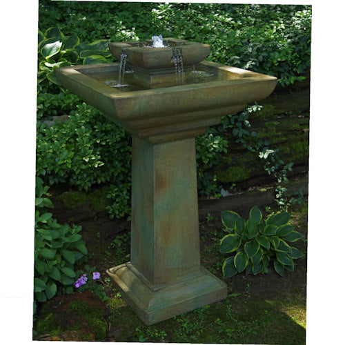 Close Up Photo Falling Water Garden Fountain with Light Concrete