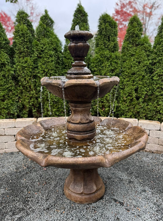 European courtyard fountain with cascading water flow