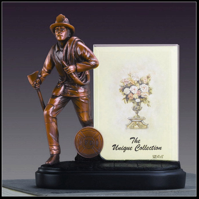 Bronze statue of a figure holding an axe on a black base picture frame sculpture for firefighters