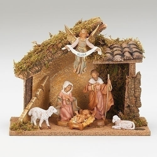 Nativity scene with figures of Mary, Joseph, and baby Jesus in a manger, with a angel and sheep on a white background.