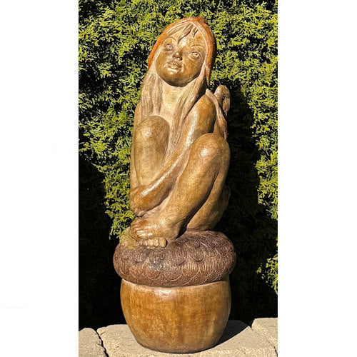 Forest Acorn Girl Garden Statue brings a charming storybook spirit to the garden