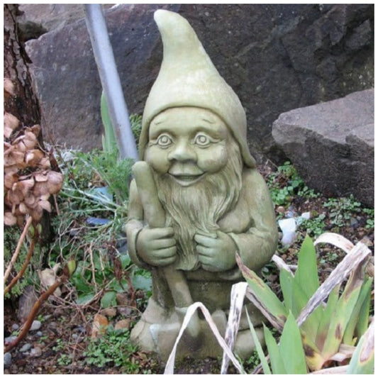 A stone garden know standing in a home landscape.