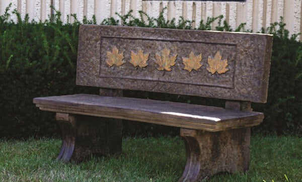 Embrace the charm and durability of our Grand Leaf Bench Cast Stone