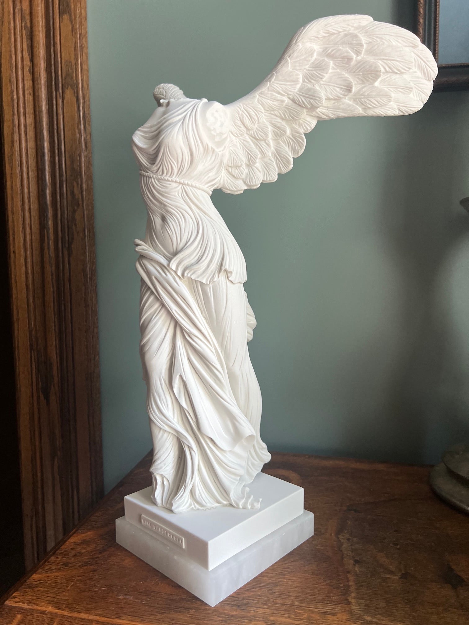 Greek goddess Nike sculpture with flowing Hellenistic drapery