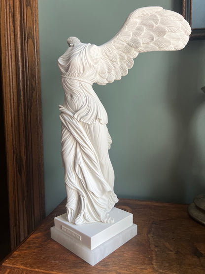 Greek goddess Nike sculpture with flowing Hellenistic drapery