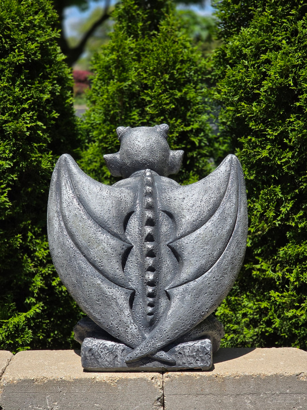 Back view Grinning Gargoyle Guardian Statue cross wings sculpture