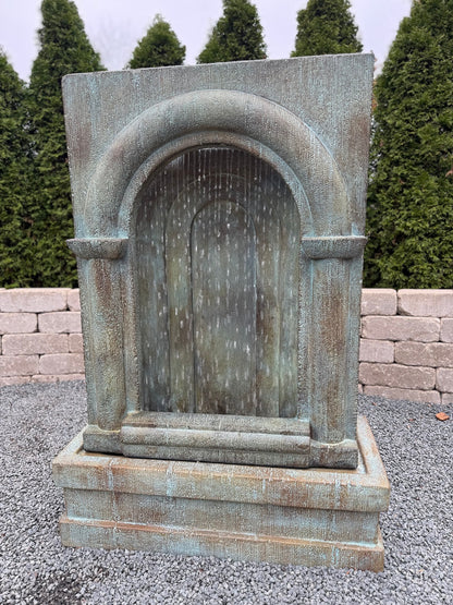 Cathedral-style outdoor fountain with cascading diamond water effect lighted grotto