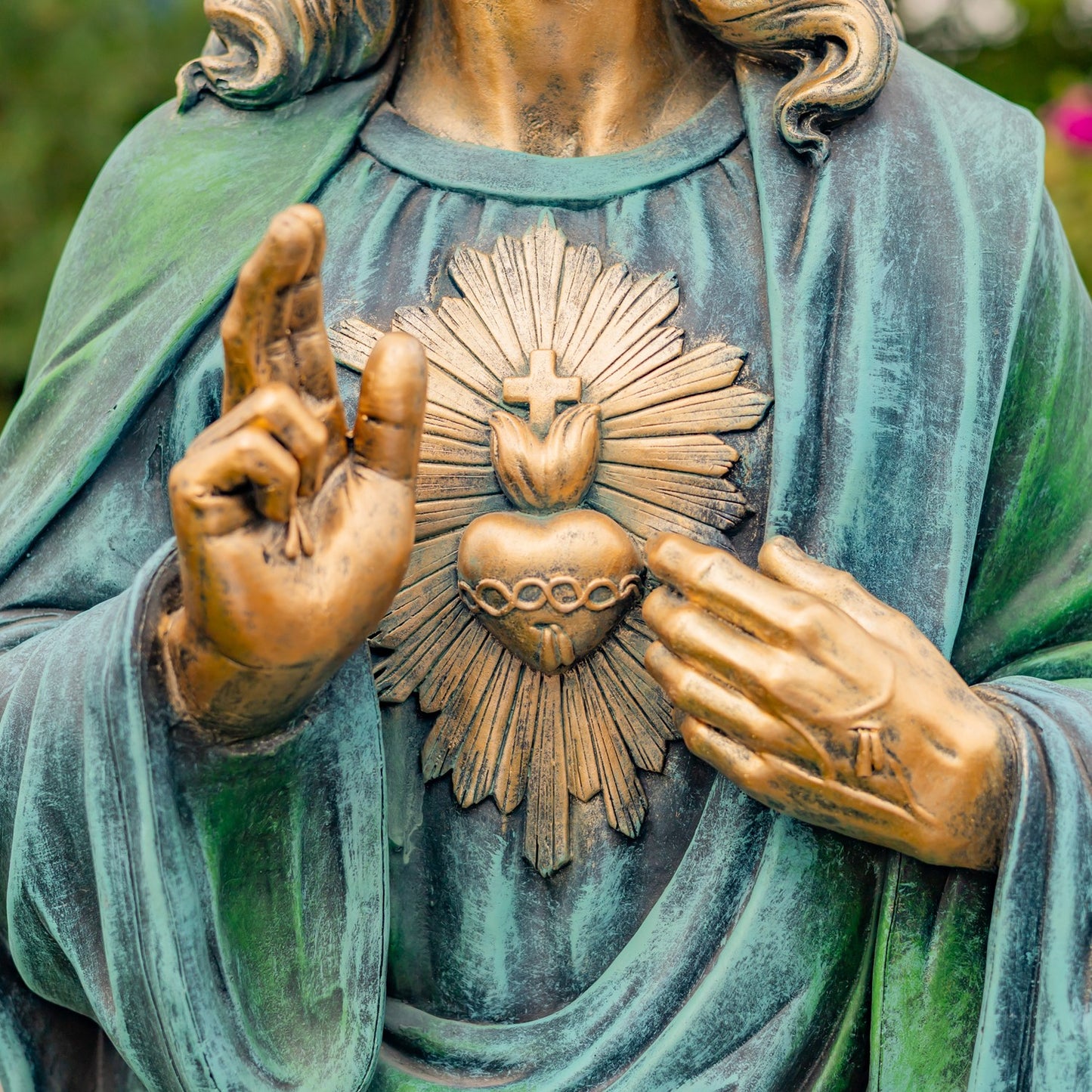 Close up of His Sacred Heart an enduring symbol on Christ Chest Statue