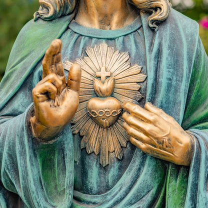 Close up of His Sacred Heart an enduring symbol on Christ Chest Statue