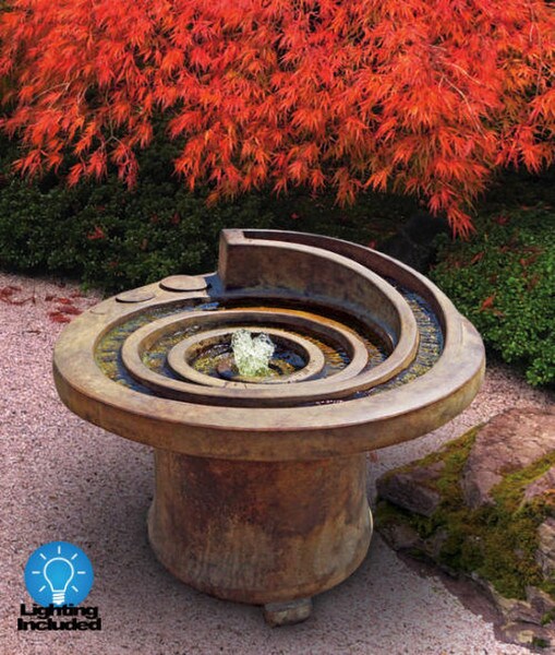 Hurricanes eye fountain in hypnotic spiral motion contemporary modern