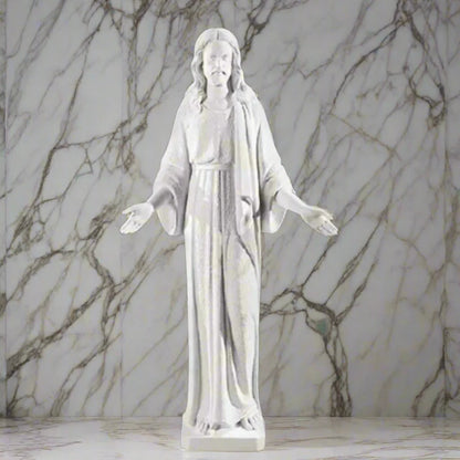 Authentic Italian marble Jesus statue, life-size and grand in scale, shown in an open-air spiritual courtyard with formal landscaping