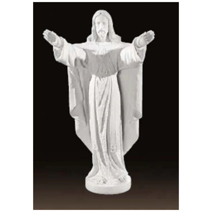 Collector-grade marble Jesus sculpture, life-size figure of Christ in blessing pose - White marble sculpture on a light brown background.