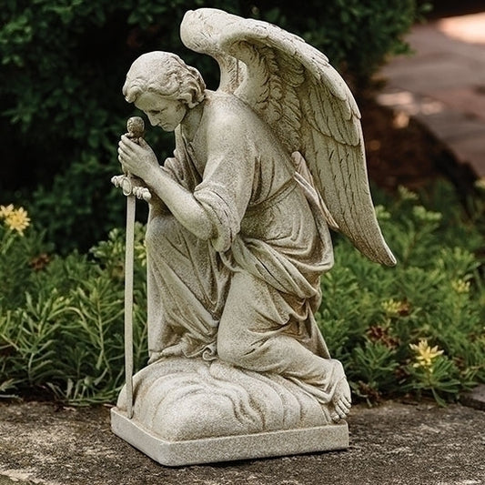Kneeling Male with Sword Statue of an angel in a garden setting