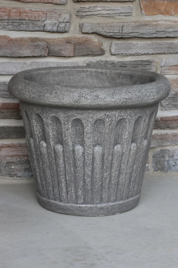 Large Arcade Cast Stone Garden Planter has a smaller matching vase